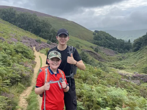 Joel and his big brother Ethan, out walking.